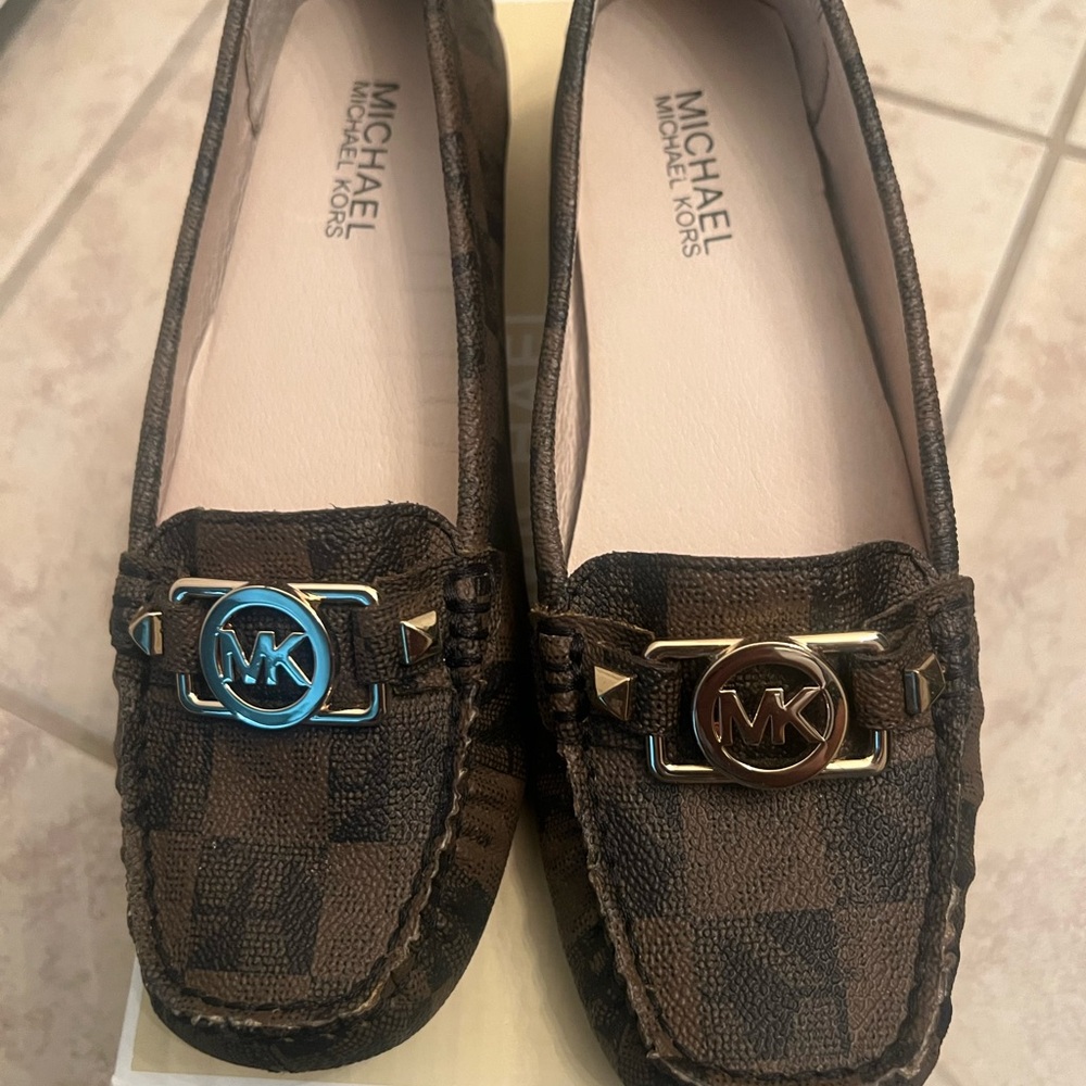 Beautiful Michael Kors loafers multi color .